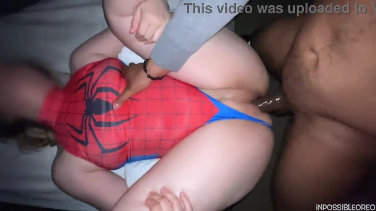 Spider-themed woman enjoys a black shaft porn video